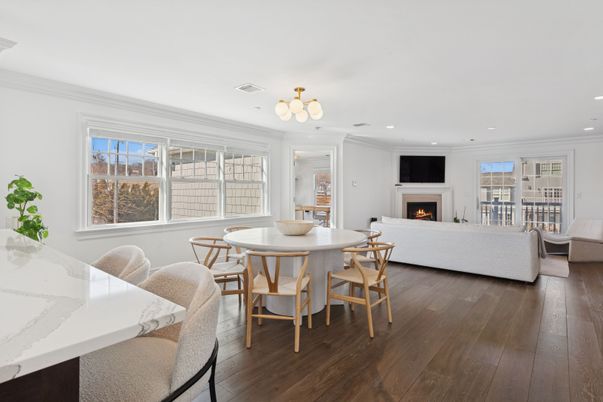 Dining room, Fireplace, Interior, Living room, Recessed Lighting, Wood Texture Flooring