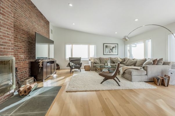 Fireplace, Interior, Living room, Recessed Lighting, Stone Walls, Wood Texture Flooring