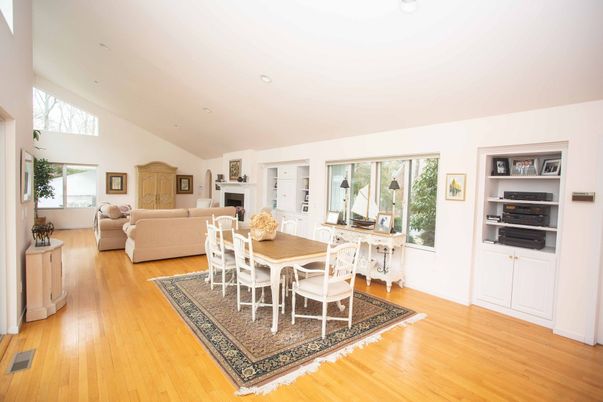Dining room, Fireplace, Interior, Living room, Recessed Lighting, Wood Texture Flooring