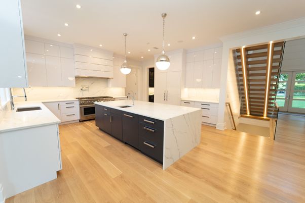 Interior, Kitchen, Marble Walls, Pendant Lights, Recessed Lighting, Stainless Steel Appliances, Wood Texture Flooring