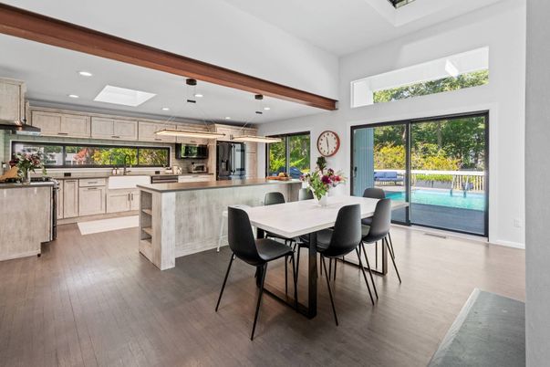 Dining room, Interior, Kitchen, Pendant Lights, Recessed Lighting, Stainless Steel Appliances, Wooden Beams, Wood Texture Flooring