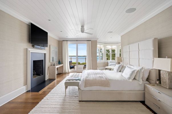Bedroom, Fireplace, Interior, Recessed Lighting, Water, Wood Texture Flooring