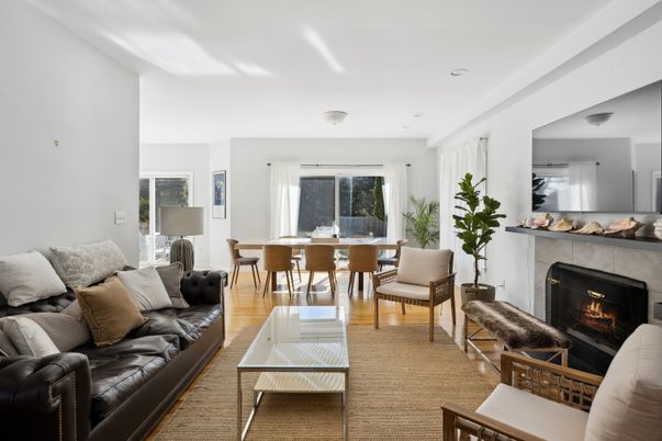 Dining room, Fireplace, Interior, Living room, Recessed Lighting, Wood Texture Flooring