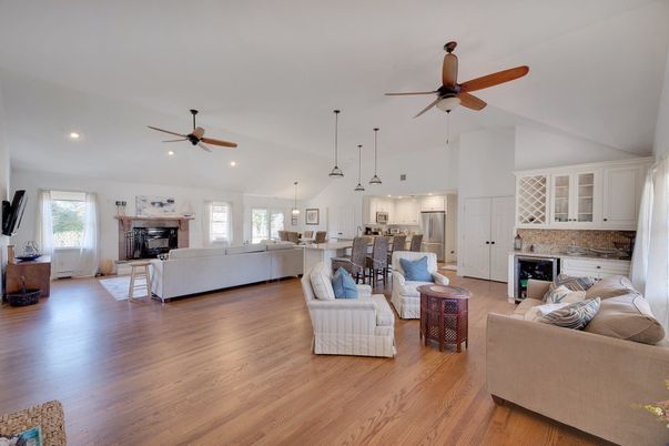 Fireplace, Interior, Kitchen, Living room, Pendant Lights, Recessed Lighting, Stainless Steel Appliances, Wood Texture Flooring