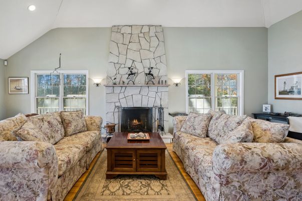 Fireplace, Interior, Living room, Recessed Lighting, Stone Walls, Wood Texture Flooring