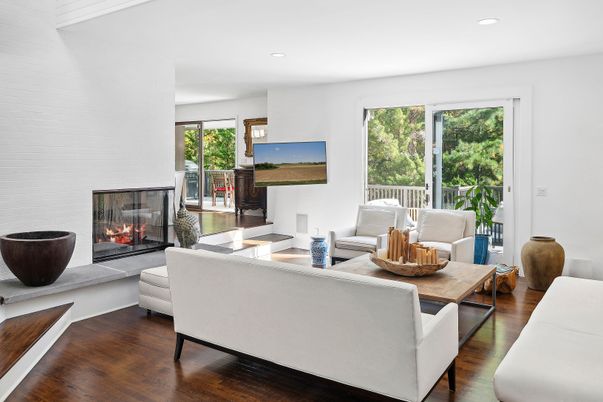 Fireplace, Interior, Living room, Recessed Lighting, Stone Walls, Wood Texture Flooring