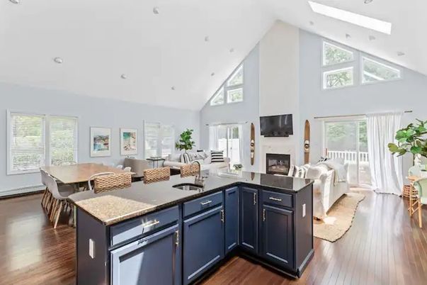 Dining room, Fireplace, Interior, Living room, Recessed Lighting, Wood Texture Flooring