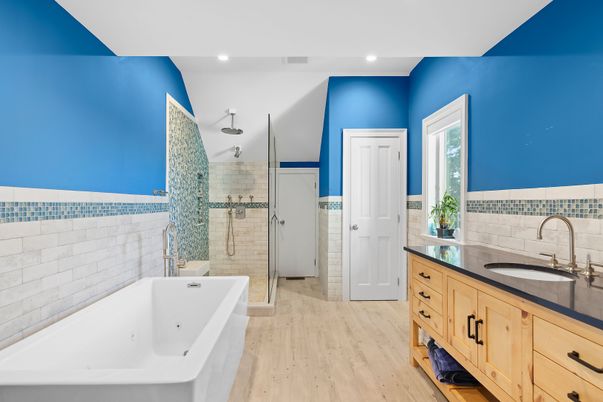 Bathroom, Dual Sink Vanities, Glass Shower, Interior, Recessed Lighting, Wood Texture Flooring