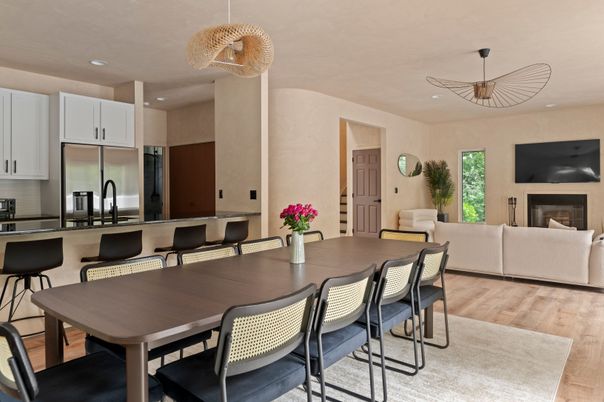 Dining room, Fireplace, Interior, Kitchen, Living room, Recessed Lighting, Stainless Steel Appliances, Wood Texture Flooring