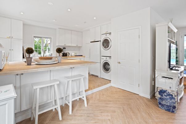 Interior, Kitchen, Recessed Lighting, Washer, Wood Texture Flooring