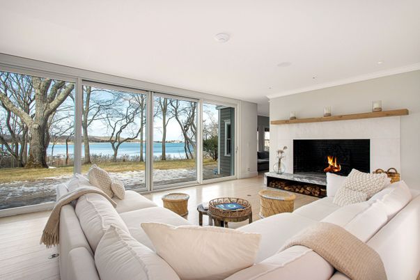 Fireplace, Interior, Living room, Recessed Lighting, Water, Wood Texture Flooring