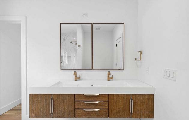 Bathroom, Dual Sink Vanities, Interior, Marble Walls, Wood Texture Flooring