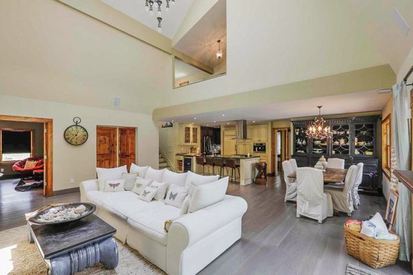 Chandelier, Dining room, Interior, Kitchen, Living room, Recessed Lighting, Stainless Steel Appliances, Wood Texture Flooring