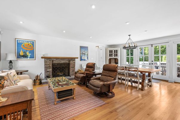 Dining room, Fireplace, Interior, Living room, Pendant Lights, Recessed Lighting, Wood Texture Flooring