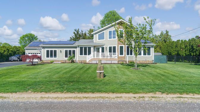Attached, Backyard, Exterior, Facade, Solar Panels, Farmhouse