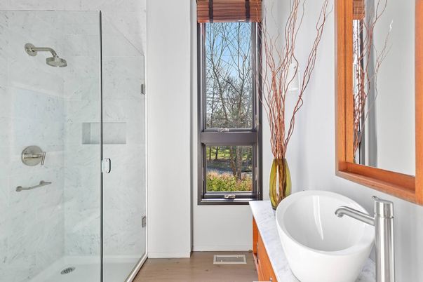 Bathroom, Glass Shower, Interior, Marble Walls, Wood Texture Flooring