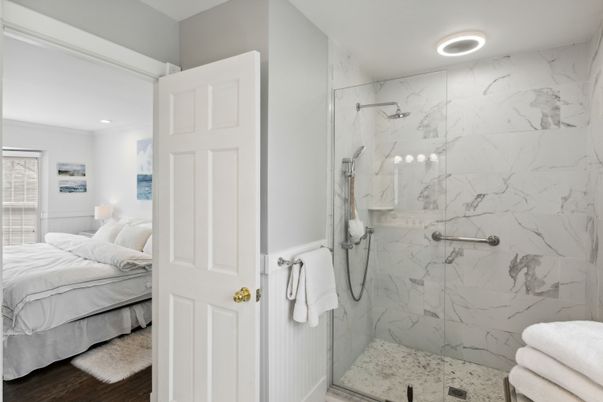 Bathroom, Bedroom, Glass Shower, Interior, Marble Walls, Recessed Lighting, Wood Texture Flooring