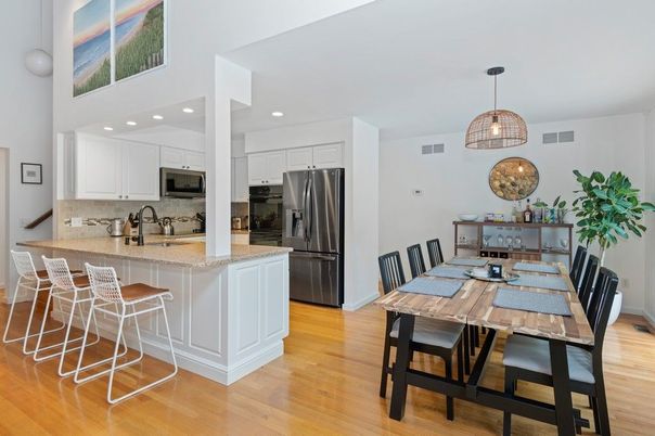 Dining room, Interior, Kitchen, Pendant Lights, Recessed Lighting, Stainless Steel Appliances, Wood Texture Flooring