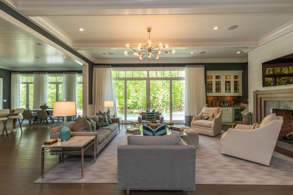 Chandelier, Dining room, Fireplace, Interior, Living room, Pendant Lights, Recessed Lighting, Wood Texture Flooring