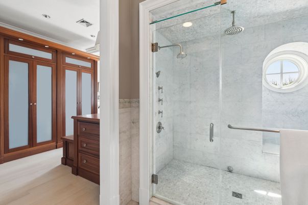 Bathroom, Glass Shower, Interior, Marble Walls, Recessed Lighting, Wood Texture Flooring