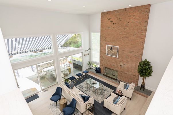 Fireplace, Interior, Living room, Recessed Lighting, Stone Walls, Wood Texture Flooring