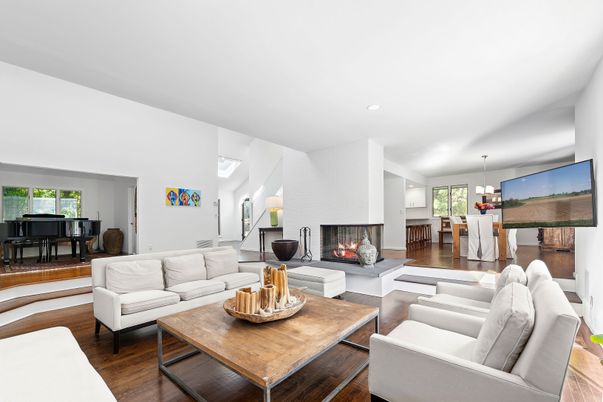 Dining room, Fireplace, Interior, Living room, Pendant Lights, Piano, Recessed Lighting, Wood Texture Flooring