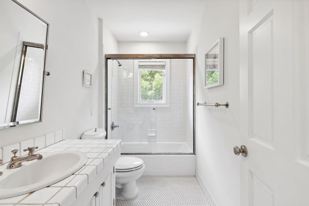 Bathroom, Dual Sink Vanities, Glass Shower, Interior, Recessed Lighting, Tile Countertops