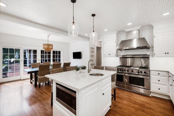 Chandelier, Dining room, Interior, Kitchen, Pendant Lights, Recessed Lighting, Stainless Steel Appliances, Wood Texture Flooring