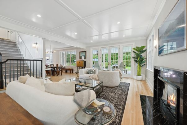 Dining room, Fireplace, Interior, Living room, Recessed Lighting, Wood Texture Flooring