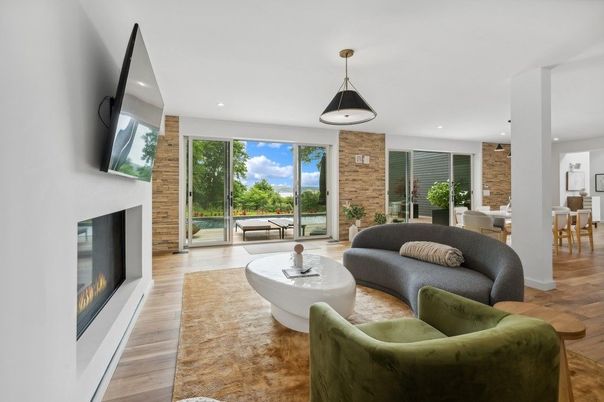 Dining room, Fireplace, Interior, Living room, Pendant Lights, Recessed Lighting, Stone Walls, Wood Texture Flooring