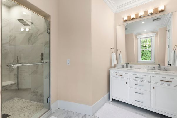 Bathroom, Dual Sink Vanities, Glass Shower, Interior, Marble Walls, Recessed Lighting