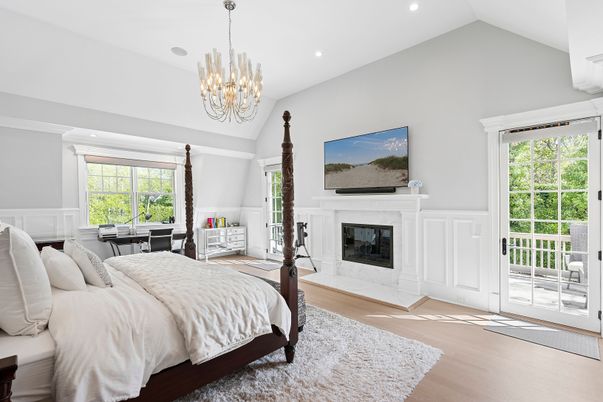 Bedroom, Chandelier, Fireplace, Interior, Recessed Lighting, Wood Texture Flooring