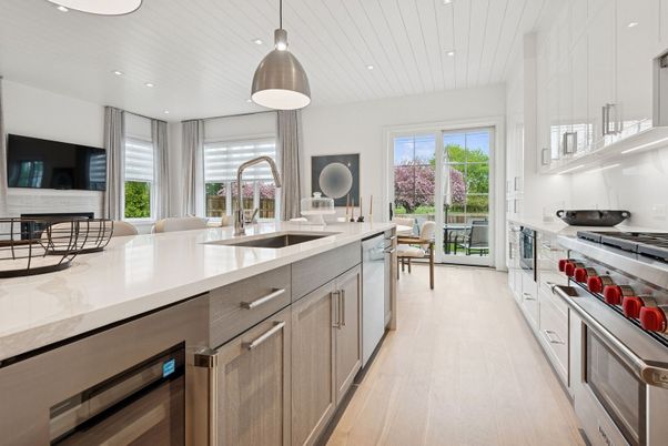 Fireplace, Interior, Kitchen, Pendant Lights, Recessed Lighting, Stainless Steel Appliances, Wood Texture Flooring