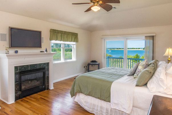 Bedroom, Fireplace, Interior, Water, Wood Texture Flooring