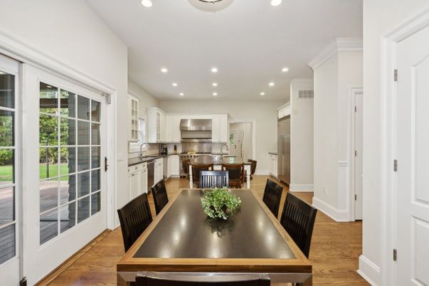 Dining room, Interior, Kitchen, Recessed Lighting, Stainless Steel Appliances, Wood Texture Flooring