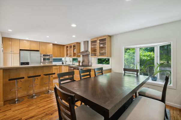 Dining room, Interior, Kitchen, Recessed Lighting, Stainless Steel Appliances, Wood Texture Flooring
