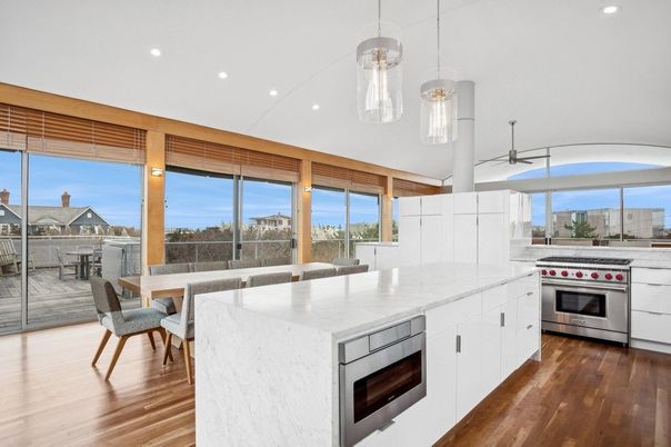 Dining room, Interior, Kitchen, Pendant Lights, Recessed Lighting, Stainless Steel Appliances, Wood Texture Flooring