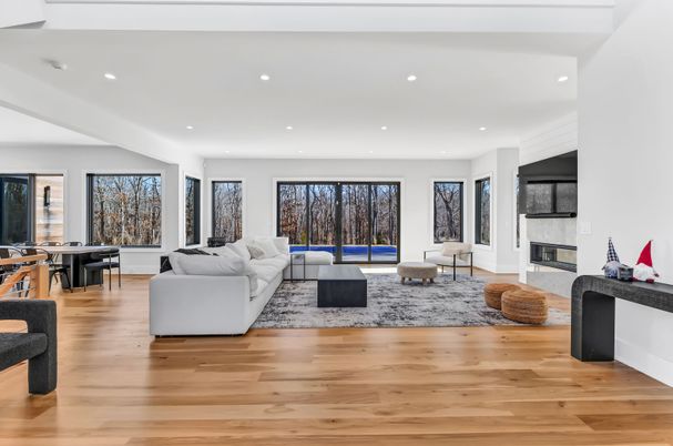 Dining room, Fireplace, Interior, Living room, Recessed Lighting, Wood Texture Flooring