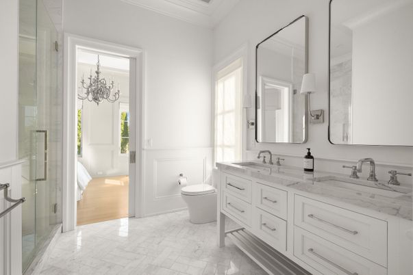 Bathroom, Dual Sink Vanities, Glass Shower, Interior, Marble, Wood Texture Flooring