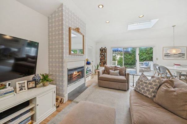 Dining room, Fireplace, Interior, Living room, Pendant Lights, Recessed Lighting, Wood Texture Flooring