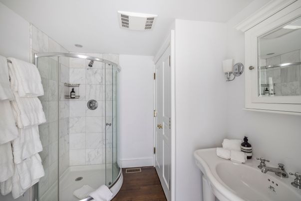 Bathroom, Glass Shower, Interior, Marble Walls, Wood Texture Flooring