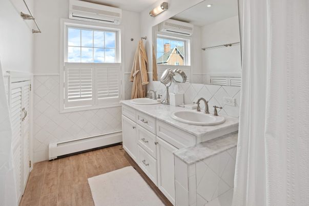 Bathroom, Dual Sink Vanities, Interior, Recessed Lighting, Wood Texture Flooring