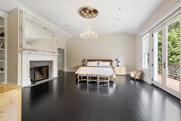 Bedroom, Chandelier, Fireplace, Interior, Recessed Lighting, Wood Texture Flooring