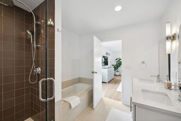 Bathroom, Dual Sink Vanities, Interior, Recessed Lighting, Wood Texture Flooring