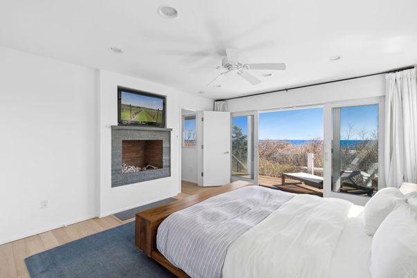 Bedroom, Fireplace, Interior, Recessed Lighting, Wood Texture Flooring