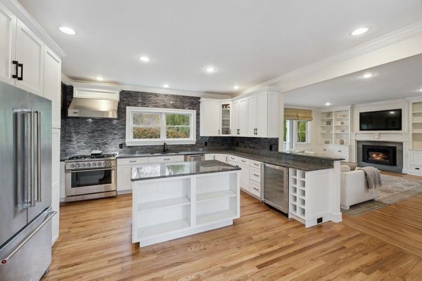 Fireplace, Interior, Kitchen, Living room, Recessed Lighting, Stainless Steel Appliances, Wood Texture Flooring