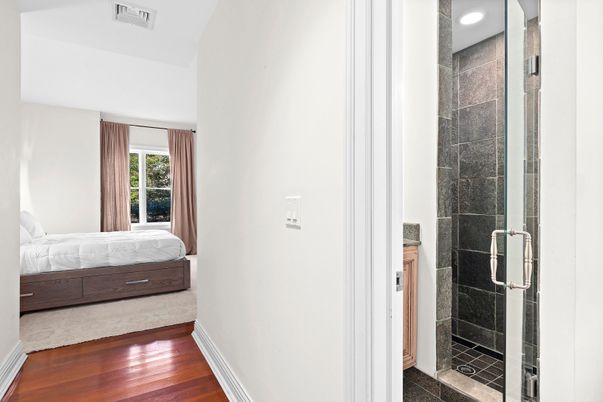 Bathroom, Bedroom, Glass Shower, Interior, Recessed Lighting, Wood Texture Flooring