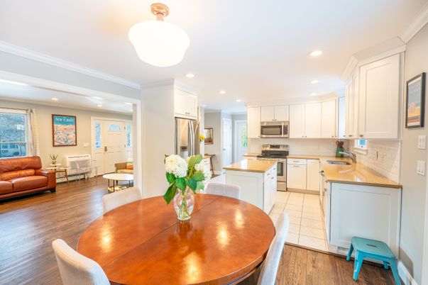Dining room, Interior, Kitchen, Living room, Recessed Lighting, Stainless Steel Appliances, Wood Texture Flooring