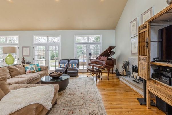 Fireplace, Interior, Living room, Piano, Recessed Lighting, Wood Texture Flooring