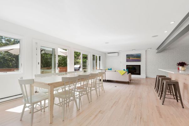 Dining room, Fireplace, Interior, Recessed Lighting, Stone Walls, Wood Texture Flooring
